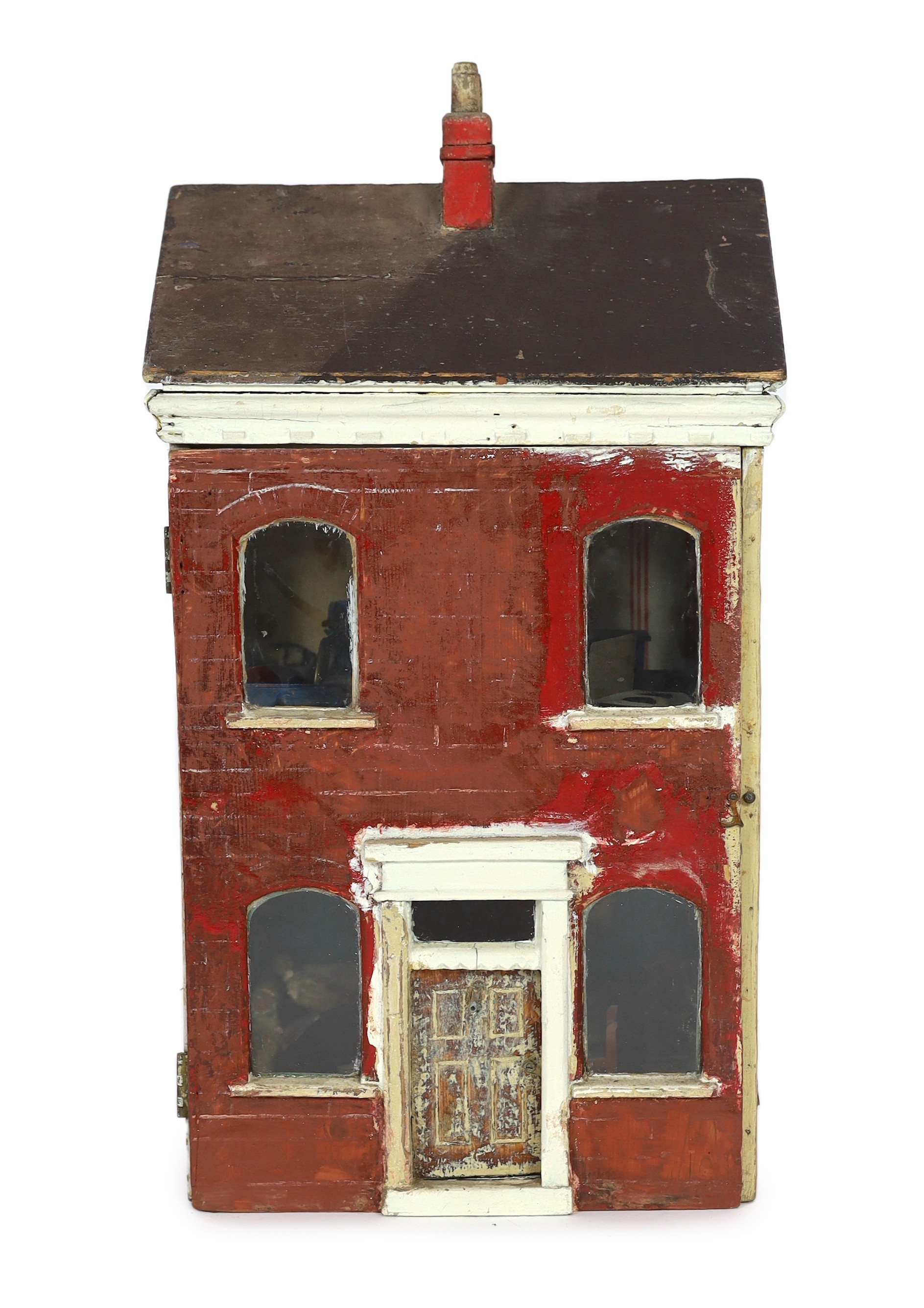 ‘Queens Lynn House’. A late 19th century home-made dolls' house, and contents, 66cm high